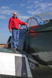 Me on the wing of a plane I flew many years ago.