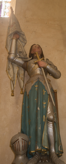 Jeanne d'Arc. Almost every church has some reference or statue of her.